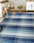 Sophisticated Elegant Blue Flatweave Wool Rug, showcasing a calming blue palette and flatweave construction in a living space setting.