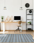 Serene Chloe Beige Flatweave Wool Rug graces a bright living room, its subtle pattern complementing the light wood floor and minimalist furniture. Beige wool fibers create a warm, inviting texture underfoot.