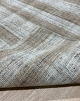 Serene Chloe Beige Flatweave Wool Rug, warm neutral tones and subtle woven texture anchoring a living room space with natural light.