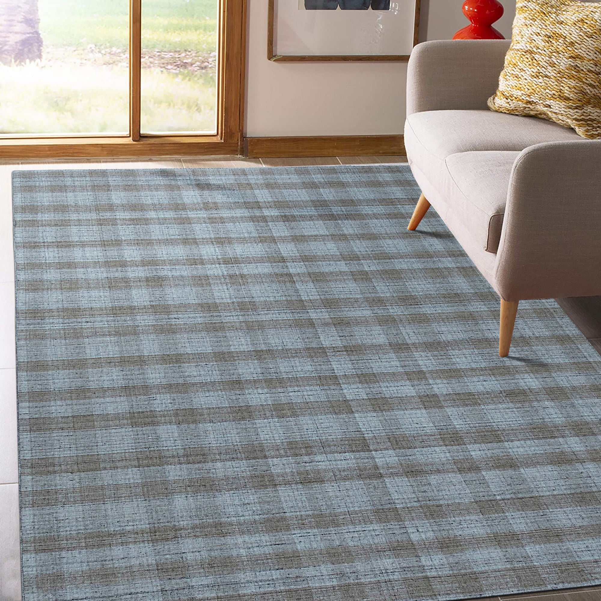 Serene Chloe Beige Flatweave Wool Rug, warm beige tones and subtle texture of a flatweave wool rug adding serene comfort to a living space with light-colored furniture.