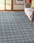 Serene Chloe Beige Flatweave Wool Rug, warm beige tones and subtle texture of a flatweave wool rug adding serene comfort to a living space with light-colored furniture.