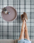 Jasmine Stylish Gray Flatweave Wool Rug displayed on a light wood floor, its intricate gray flatweave design offering a modern yet grounded aesthetic.