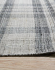 Jasmine Stylish Gray Flatweave Wool Rug, a cool gray wool flatweave adding subtle texture and modern elegance to a bright, minimalist living space.