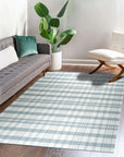 Handcrafted Vibrant Gray Flatweave Wool Rug, showcasing a soft, textured gray wool construction with subtle variations in tone, filling a modern living room space with warmth and understated style.
