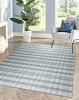 Handcrafted Vibrant Gray Flatweave Wool Rug, a gray wool rug featuring a subtle, textured flatweave design, displayed on a light-colored wooden floor.