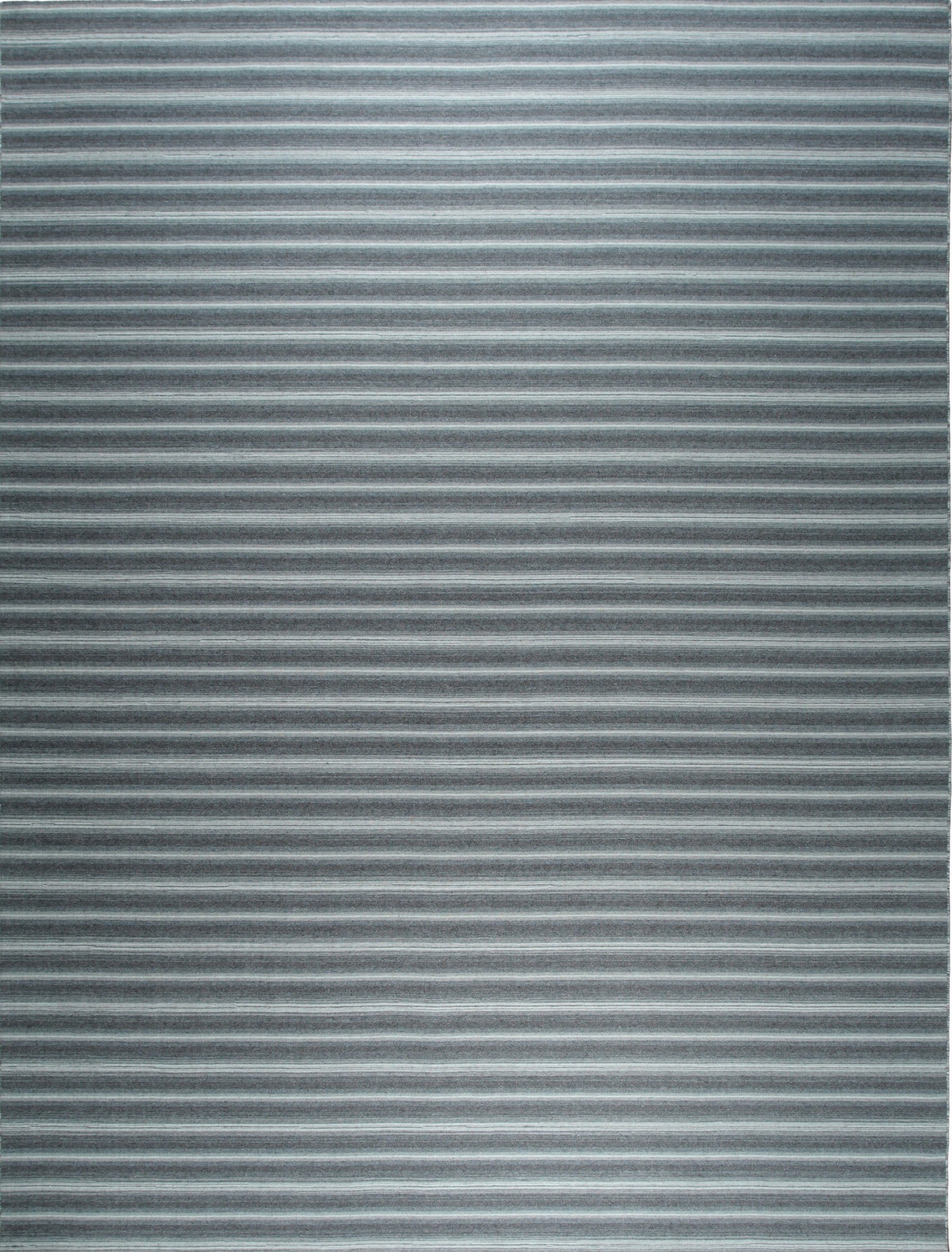 Isolated view of Lush Timeless Gray Flatweave Wool Rug, showcasing its subtle texture and consistent gray tone.