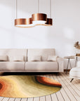 Stylish Sloane Multicolor Hand Tufted Wool Rug, showcasing vibrant hues and textures in a contemporary living space; light wood flooring complements the rug's dynamic pattern, adding warmth and visual interest.