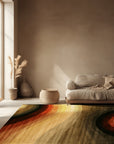 Stylish Sloane Multicolor Hand Tufted Wool Rug, vibrant hues blending across its plush wool surface, creates a dynamic focal point on a polished wood floor.