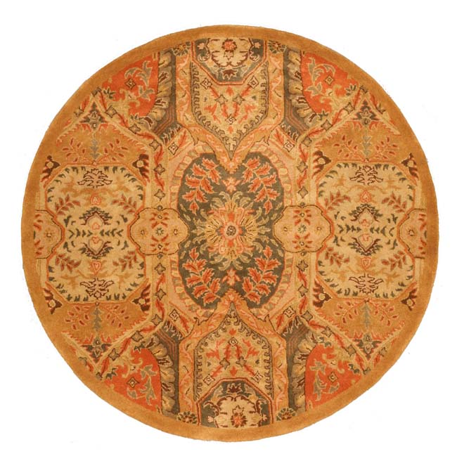 Ophelia Bianca Orange Hand Tufted Wool Rug, warm orange hues and plush texture create a cozy, inviting atmosphere on a polished wood floor.