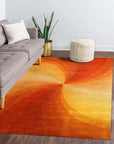 Versatile Sleek Orange Hand Tufted Wool Rug, its vibrant orange hue illuminating a warmly lit interior. Hand tufted wool construction evident in the rug's plush texture, lending a soft and inviting feel to the space.