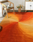 Versatile Sleek Orange Hand Tufted Wool Rug, vibrant orange wool creating a textured surface in a bright, modern living room setting.