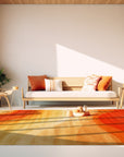 Classic Vibrant Orange Hand Tufted Wool Rug displayed on a light wood floor, its rich orange hue and textural hand-tufted wool construction creating a warm and inviting atmosphere.