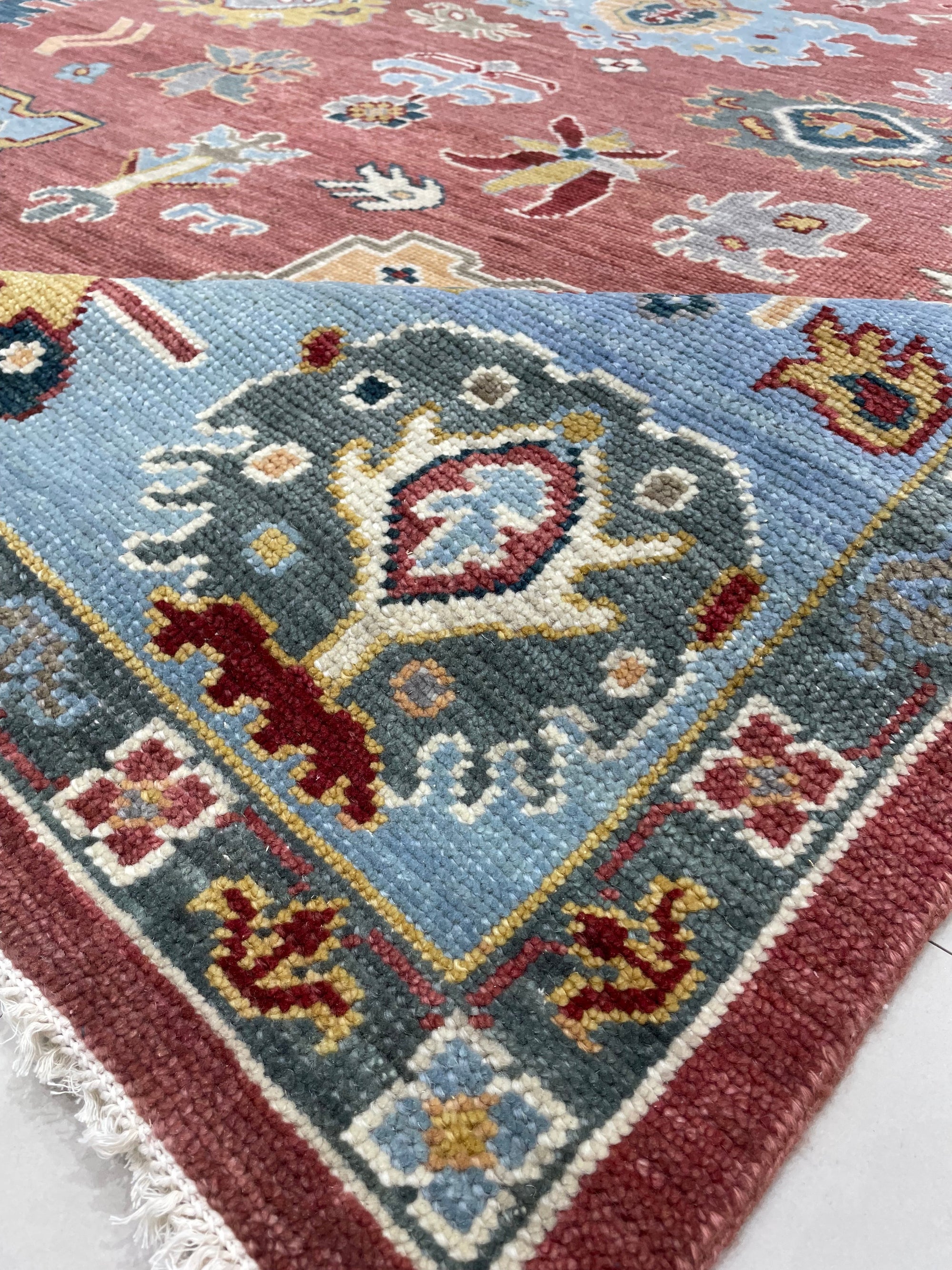 Mira Traditional Rust Hand Knotted Wool Rug, richly patterned rust and cream wool rug hand-knotted with an intricate traditional design, displayed in a well-lit room setting.