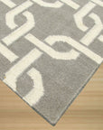 Sloane Cozy Grey Flatweave Wool Rug, soft grey tones and subtle texture define this flatweave wool rug, grounding a bright, airy living room with a modern, minimalist aesthetic.