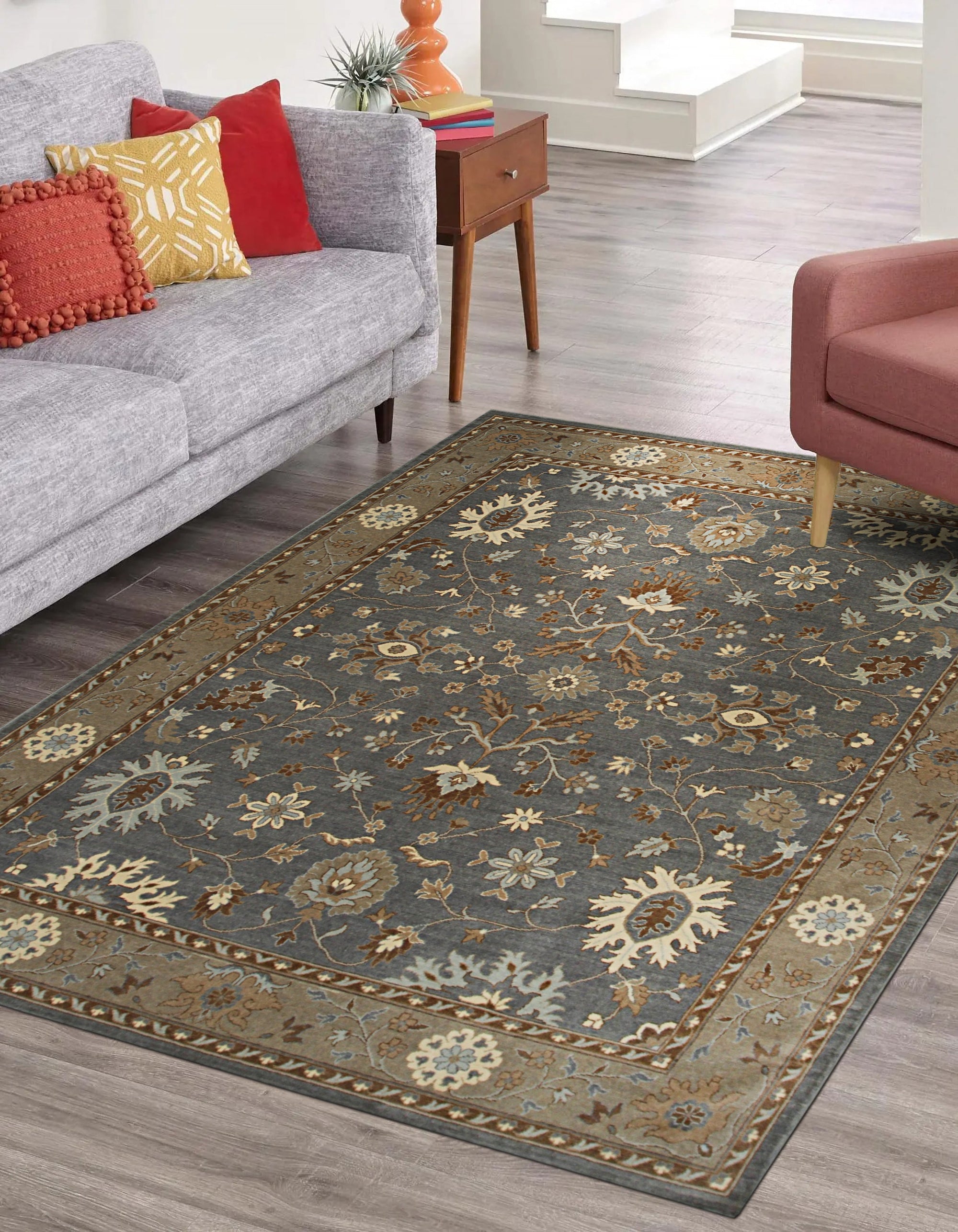 Timeless Oushak Gray Hand Knotted Wool Rug displayed in a bright, airy living room. Soft gray hues and intricate Oushak patterns adorn this hand-knotted wool rug, creating a sophisticated and inviting space.