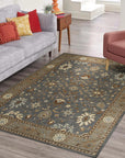 Timeless Oushak Gray Hand Knotted Wool Rug displayed in a bright, airy living room. Soft gray hues and intricate Oushak patterns adorn this hand-knotted wool rug, creating a sophisticated and inviting space.