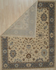 Opulent Oushak Ivory Hand Knotted Wool Rug, showcasing its intricate floral design in soft ivory tones, hand-knotted for a luxurious and timeless appeal.