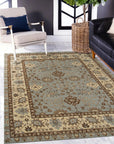 Artisan Oushak Light Blue Hand Knotted Wool Rug, displaying intricate floral patterns in soft blues and creams, lending an airy, sophisticated touch to a well-lit living room setting.