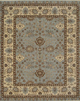 Isolated view showcasing the Artisan Oushak Light Blue Hand Knotted Wool Rug's intricate floral design and soft, calming color palette.
