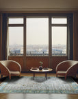 Classic Oushak Beige Hand Knotted Wool Rug, its subtle beige tones and intricate Oushak design elegantly grounding a contemporary living space.