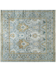 Freya Oushak Green Hand Knotted Wool Rug displayed, featuring a traditional Oushak design in shades of green and cream.