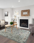 Versatile Oushak Ivory Hand Knotted Wool Rug, showcasing a creamy, warm ivory tone and intricate, traditional Oushak design details in a softly lit room setting.