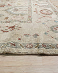 Versatile Oushak Ivory Hand Knotted Wool Rug, an ivory wool rug with a traditional Oushak design, seen in a living room setting, adding warmth and elegance to the space.