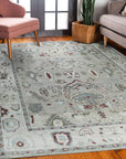 Versatile Oushak Ivory Hand Knotted Wool Rug, a serene expanse of creamy ivory wool detailed with a subtle, classic Oushak pattern, anchors a bright, sunlit living room.