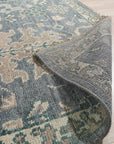 Beautiful Oushak Blue Hand Knotted Wool Rug, a calming blue wool rug with a traditional Oushak pattern, seen in a bright, airy room.