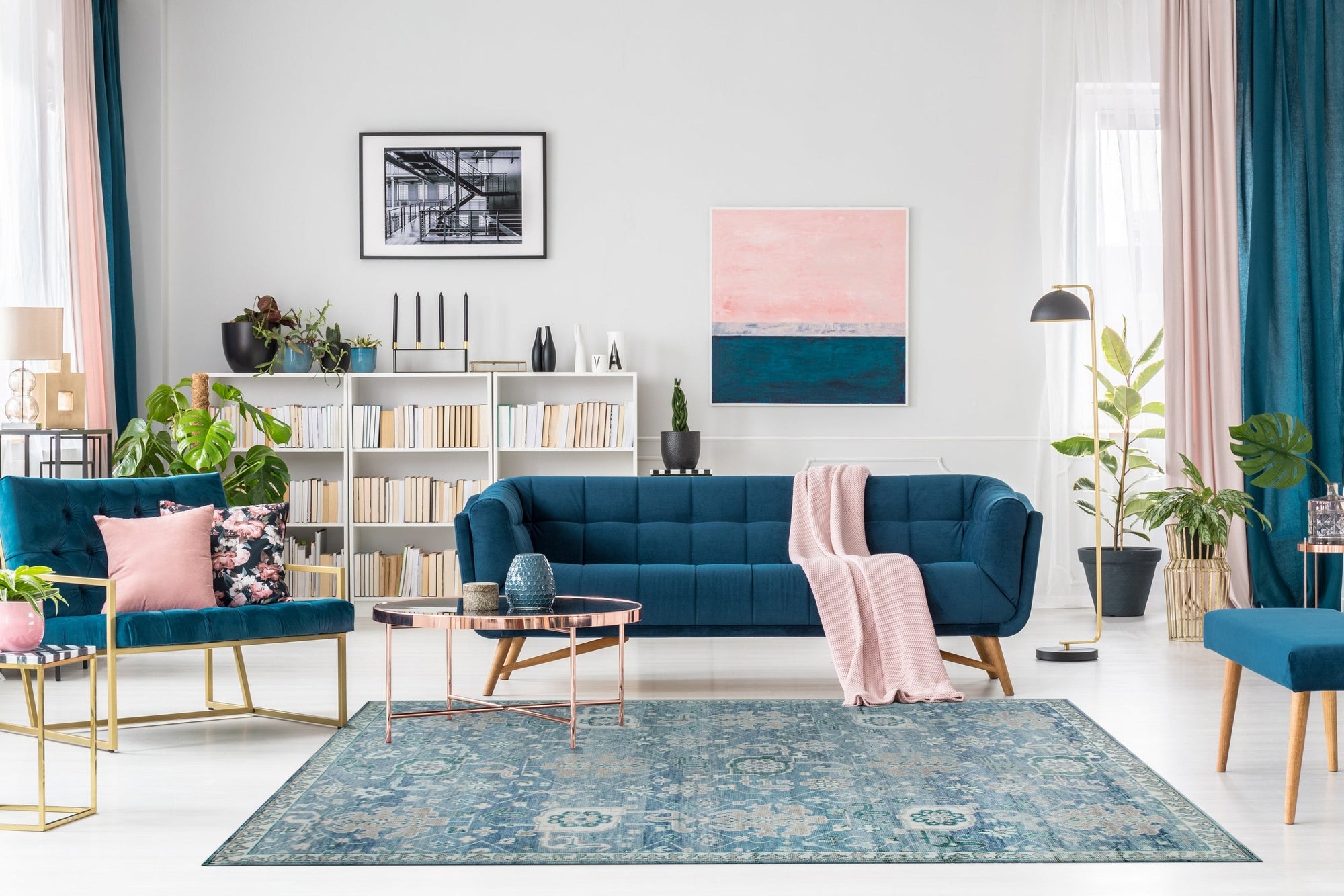 Beautiful Oushak Blue Hand Knotted Wool Rug, displaying intricate floral patterns in soft blues and creams, seen in a well-lit interior setting.