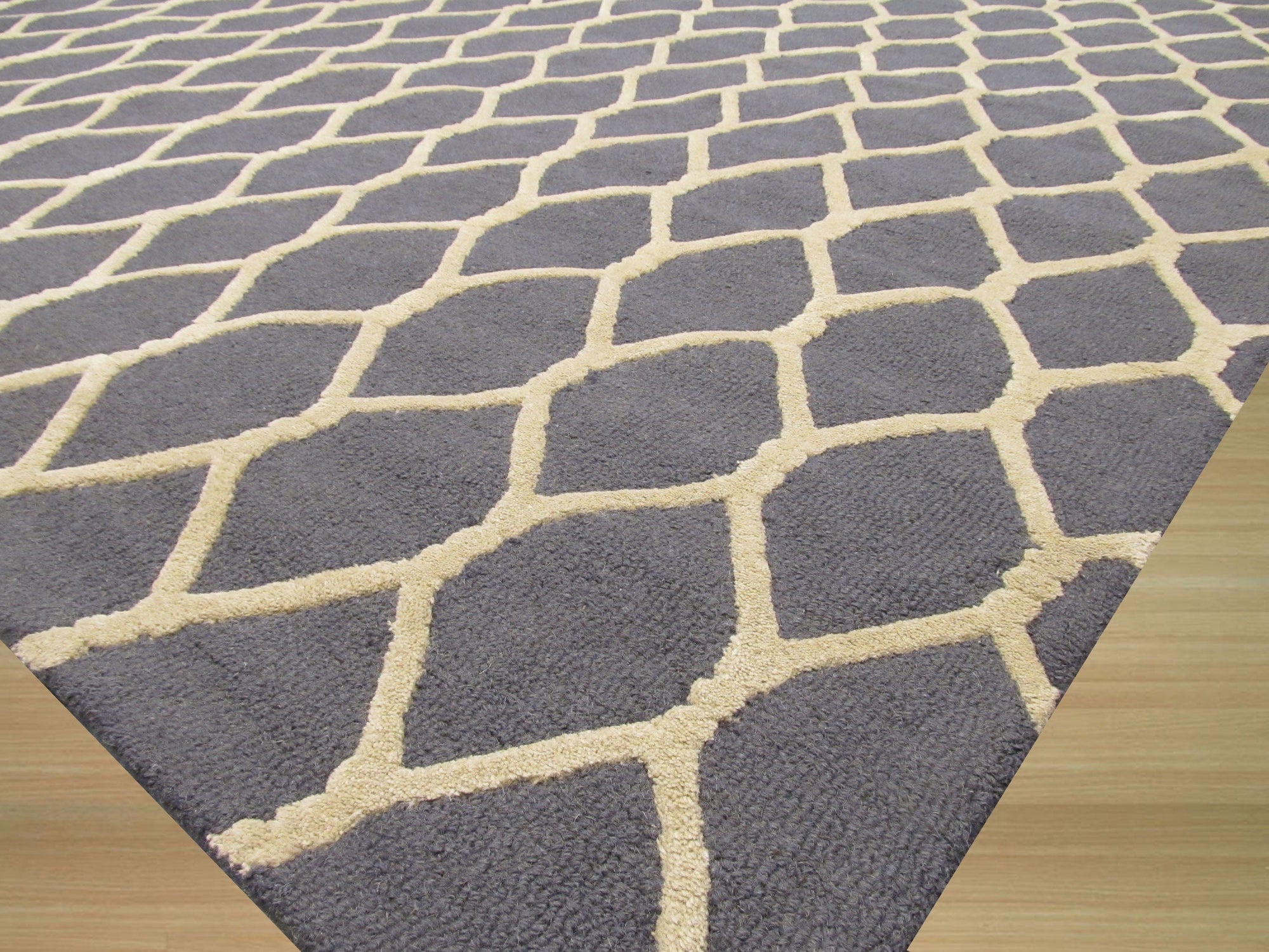 Versatile Comfortable Gray Hand Tufted Wool Rug, soft gray wool providing warmth underfoot in a modern living space.