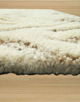 Chloe Trellis Ivory Hand Tufted Wool & Viscose Rug, showcasing an elegant trellis pattern in soft ivory hues, hand-tufted for luxurious texture underfoot.
