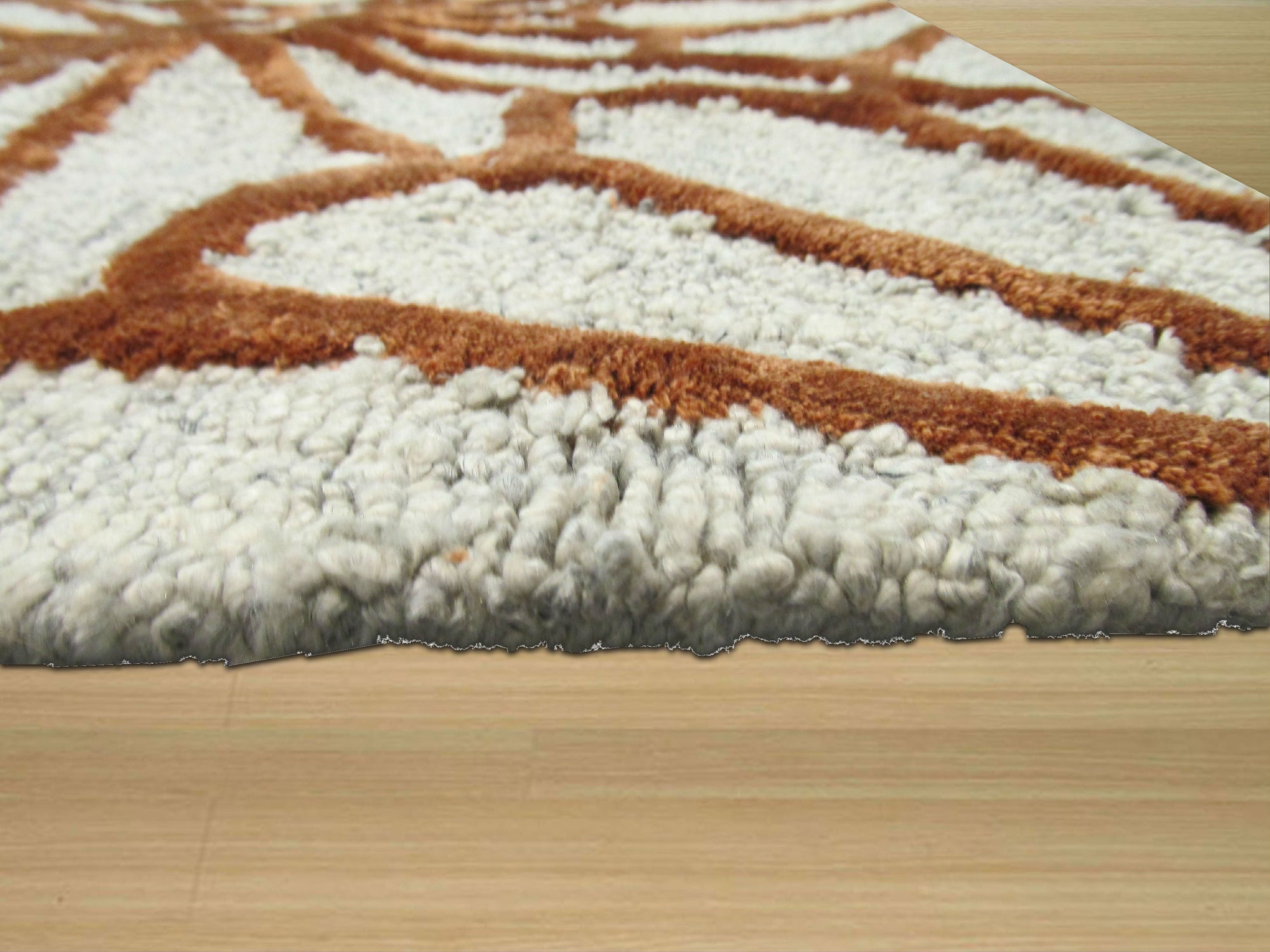 Nadia Trellis Ivory Hand Tufted Wool & Viscose Rug, ivory tones and subtle texture define this hand-tufted rug, showcasing a trellis design in a bright, airy setting.