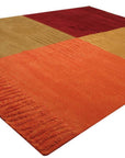 Celia Sophisticated Multicolor Hand Tufted Wool Rug, its vibrant hues and textures adding warmth to a modern living space, features a dynamic design.