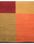 Celia Sophisticated Multicolor Hand Tufted Wool Rug, vibrant threads coalesce in a contemporary design, showcasing the rug's rich texture and multicolored palette in a home setting.