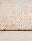 Cozy Vibrant Rust Hand Tufted Wool Rug, a warm, textured accent rug with a dynamic, abstract pattern in shades of rust and cream, showcased on a light wood floor.
