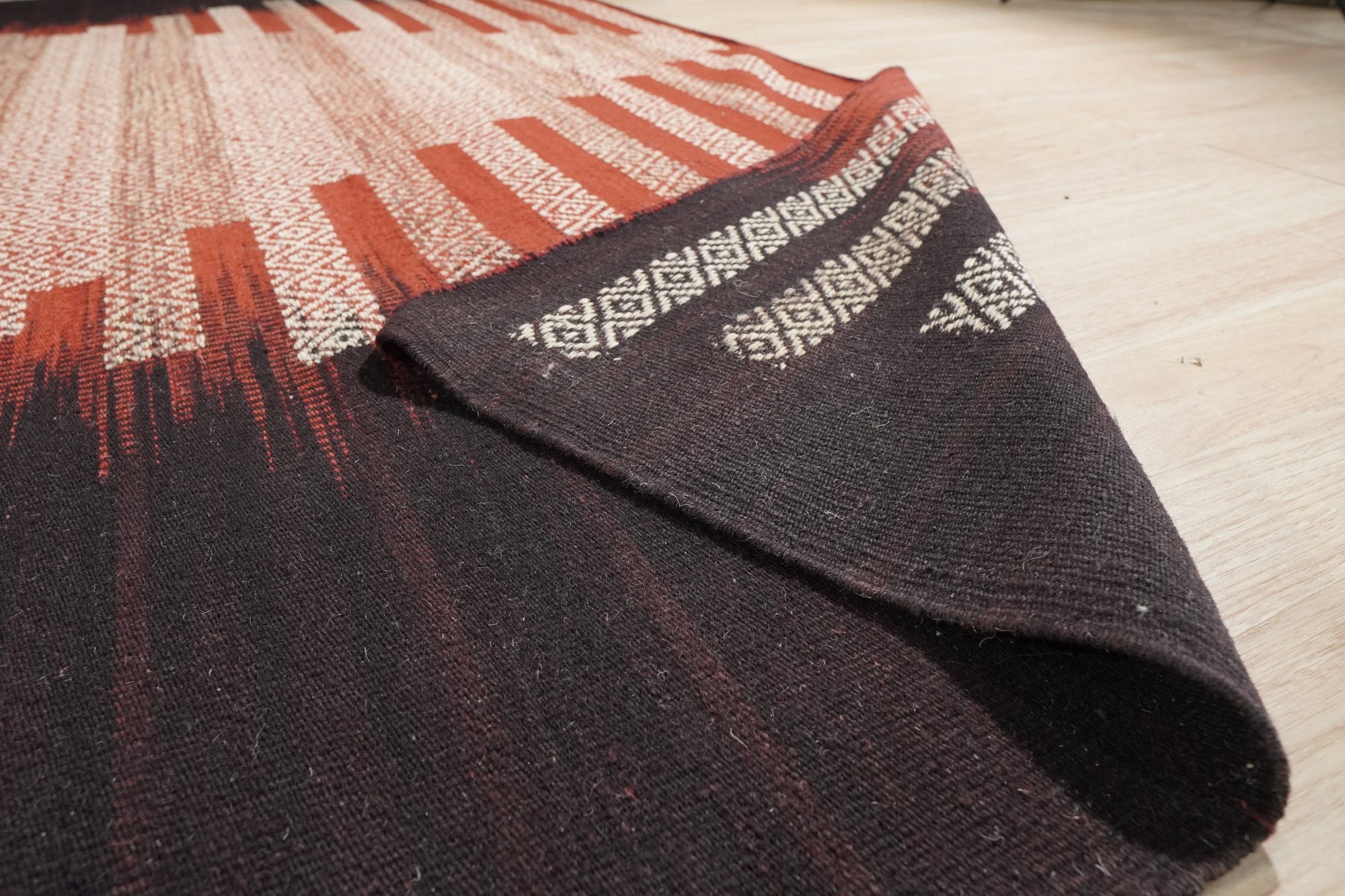 Dazzling Sleek Red Flatweave Wool Rug, a vibrant red wool rug with a flatweave construction, displayed in a bright, contemporary living space.
