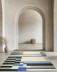 Celia Nadia Multicolor Flatweave Wool Rug, vibrant hues dance across a woven texture, grounding a living space with warmth and bohemian flair.