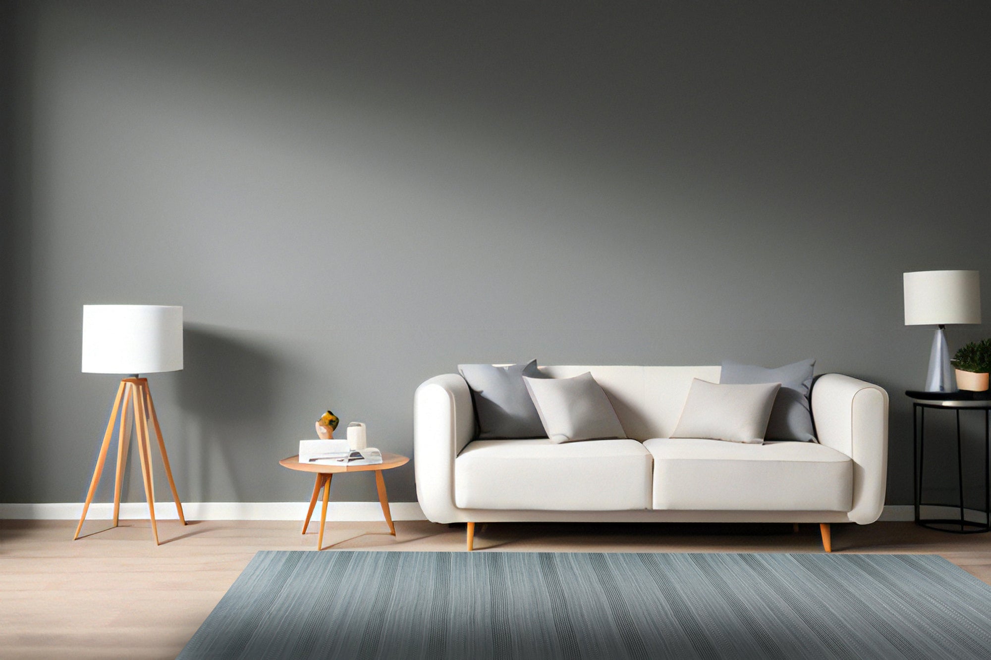 Captivating Talia Gray Handmade Wool Rug displayed on a light hardwood floor, its subtle gray tones and textured wool weave adding warmth to the modern interior.