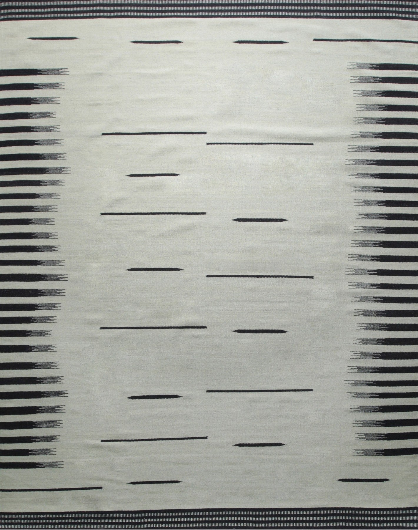 Isolated view of Sloane Majestic Gray Flatweave Wool Rug, showcasing its flatweave construction and subtle gray color variations.
