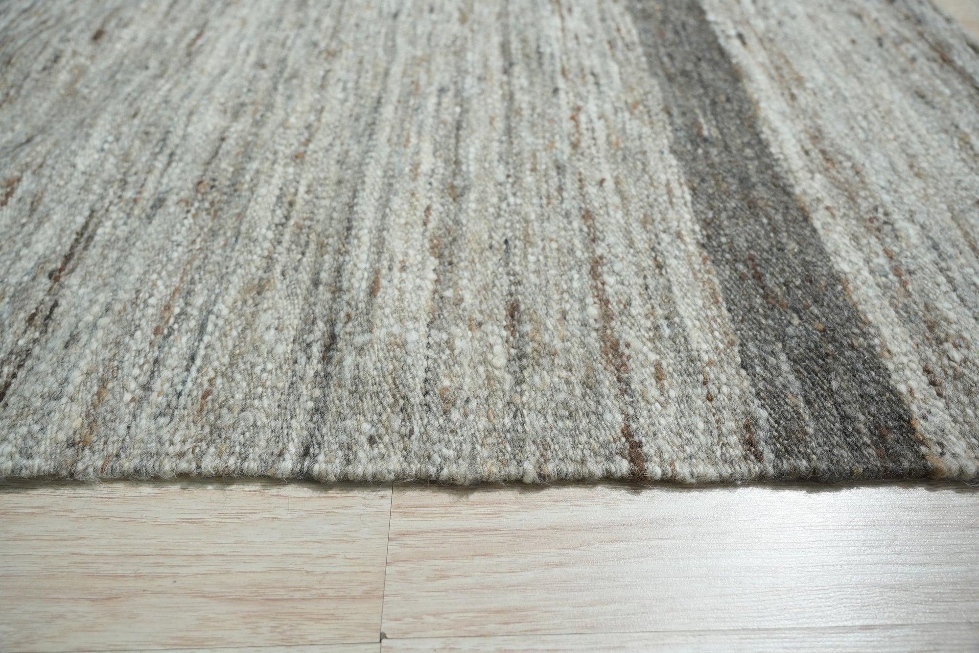 Lila Violet Light Gray Flatweave Wool Rug, a blend of soft violet and light gray hues in a flatweave construction, offering a subtle, contemporary style.