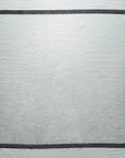 Isolated view of Artisan Nadia Ivory Flatweave Wool Rug, showcasing its intricate geometric pattern in soft ivory hues.