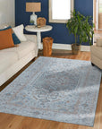 Fiona Vibrant Ivory Handmade Wool Rug, creamy wool textures meet lively patterns in a bright living room setting, evoking a sense of cozy sophistication.