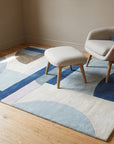 Bespoke Iris Multicolor Hand Tufted Wool Rug in a reading nook