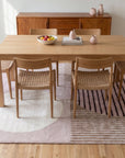 Bespoke Versatile Pink and Gray Hand Tufted Wool Rug in a dining room