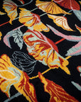 Black floral contemporary rug angled field detail