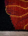 Black floral contemporary rug pile texture close-up