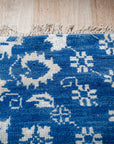 Blue ivory Oushak rug hand-knotted back and fringe detail