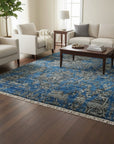 Blue modern floral hand-knotted wool and bamboo silk rug MR6907BL shown in a styled interior setting