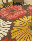 Brown transitional floral rug angled view with oversized blooms